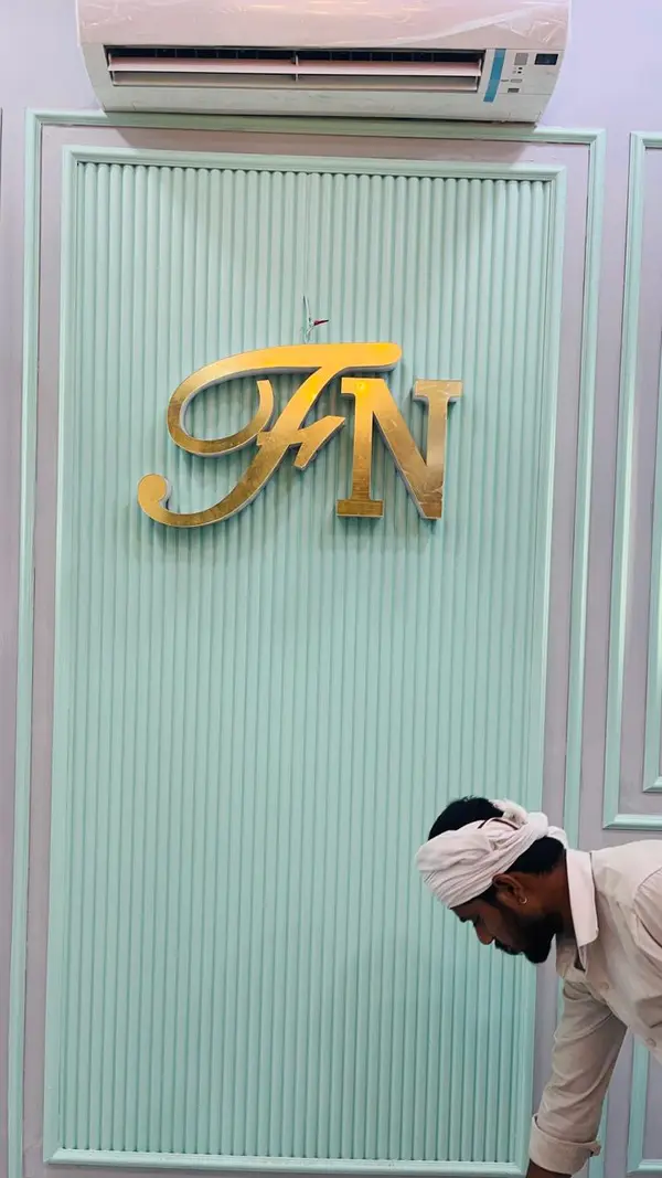 Forever Nails gold monogram interior sign by Brandmaxx